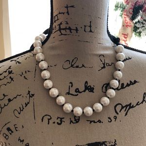 White beaded necklace with silk tie